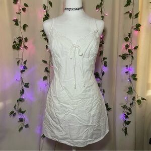 White mini dress with front adjustable ties